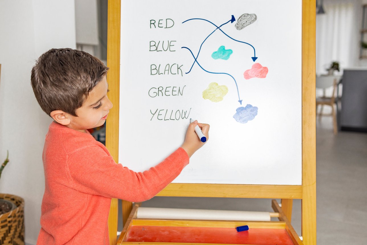 Little Boy Learning English at Home